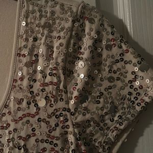 Beige cotton t shirt with sparkling glitters.